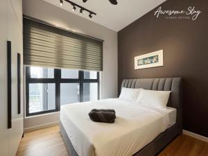 Cama o camas de una habitación en Sunway Velocity Two By Awesomestay
