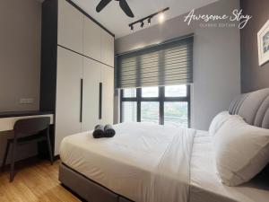 Cama o camas de una habitación en Sunway Velocity Two By Awesomestay