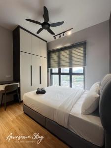 Cama o camas de una habitación en Sunway Velocity Two By Awesomestay