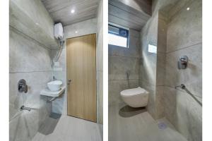a bathroom with a toilet and a sink at Raman Dormitory in Navi Mumbai