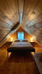 Tempat tidur dalam kamar di Brzozowy zakątek