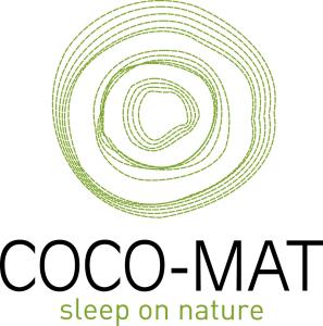 een logo voor de coo mat slaap op de natuur bij Troia Resort Luxury Studios in Asprovalta
