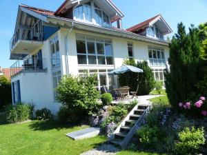a house with a garden in front of it at Lovely holiday home near the ski-area in Missen
