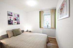 Postel nebo postele na pokoji v ubytování Appartement Riedingtal