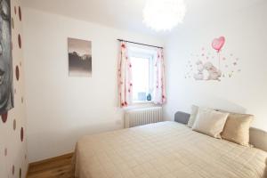 Postel nebo postele na pokoji v ubytování Appartement Riedingtal