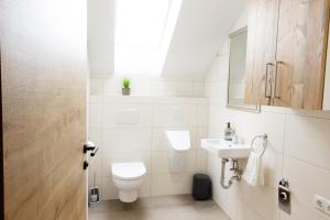 Koupelna v ubytování Appartement Riedingtal + 5 fotografií