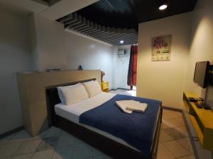 Balai Subik Hotel客房内的一张或多张床位