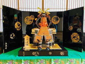 a figurine of a person on top of a table at 甘糟屋敷 Amakasu Yashiki KAMAKURA in Kamakura