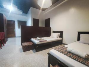 Balai Subik Hotel客房内的一张或多张床位