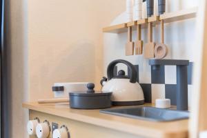 Cucina o angolo cottura di ガジュマルの庭～itoman