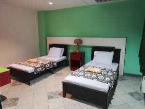 Balai Subik Hotel客房内的一张或多张床位