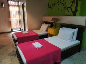 Balai Subik Hotel客房内的一张或多张床位