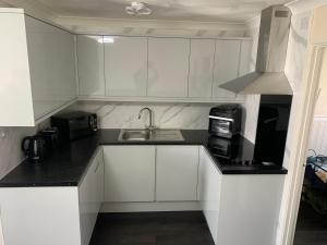 Køkken eller tekøkken på 54 Belle Aire Hemsby + 4 billeder