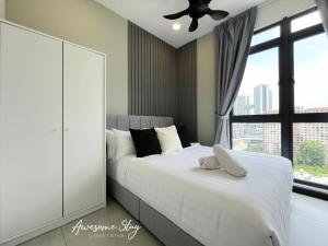 Neu Suites By Awesomestay客房内的一张或多张床位