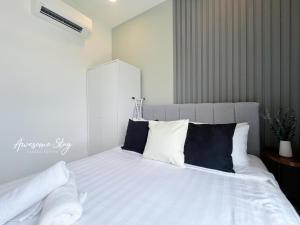 Neu Suites By Awesomestay客房内的一张或多张床位