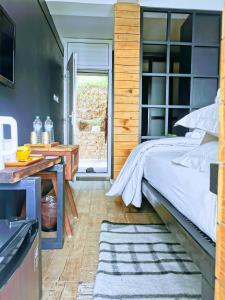 Voodi või voodid majutusasutuse Gusto Accommodation toas