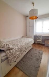 Giường trong phòng chung tại Apartamento 2 HABITACIONES Las Clavellina de Moret AT-CC-00803 Cáceres