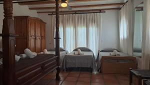 Postel nebo postele na pokoji v ubytování Villa Puerto Blanco + 37 fotografií