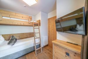 Łóżko lub łóżka w pokoju w obiekcie Gletscherblick- serviced apartments