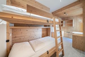 Łóżko lub łóżka w pokoju w obiekcie Gletscherblick- serviced apartments