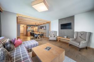 Telewizja i/lub zestaw kina domowego w obiekcie Gletscherblick- serviced apartments