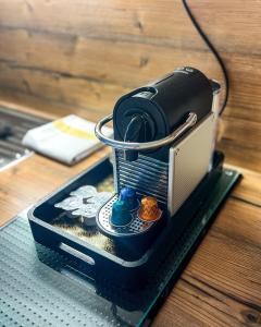 a camera sitting on top of a table at MyRoom Apartment in Munich in Munich