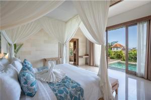 Ένα ή περισσότερα κρεβάτια σε δωμάτιο στο Happy Honeymoon Private Villa