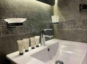 Koupelna v ubytování Elite Boutique Hotel