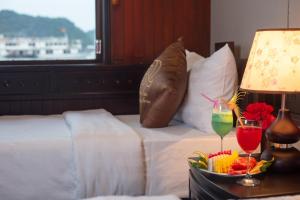 Ein Bett oder Betten in einem Zimmer der Unterkunft Ruby Cruise