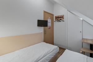 Postel nebo postele na pokoji v ubytování Stay Express