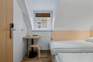 Postel nebo postele na pokoji v ubytování Stay Express