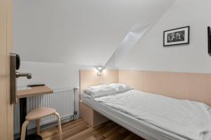 Postel nebo postele na pokoji v ubytování Stay Express