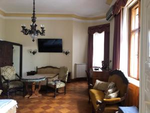 TV a/nebo společenská místnost v ubytování Kalmár Panzió