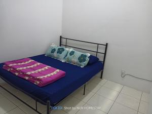 Fotografie z fotogalerie ubytování Nur’s Homestay v destinaci Kuala Kelawang