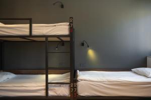 Voodi või voodid majutusasutuse Kantar Hostel toas