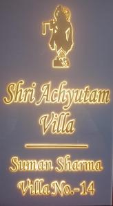 un cartello per un ristorante in lingua straniera di Shri Achyutam Villa a Vrindāvan