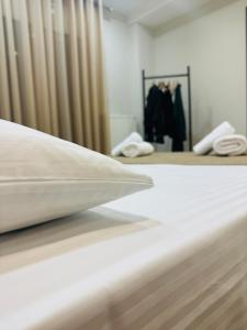 a close up of a bed in a bedroom at Elite Haven in Alexandroupoli +11 photos