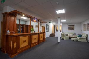 The lobby or reception area at Hotel Toliar