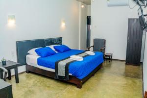 Ένα ή περισσότερα κρεβάτια σε δωμάτιο στο ShiCo Transit Hotel
