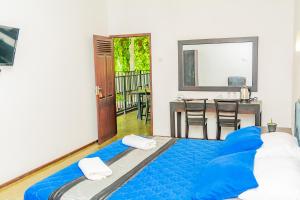 Ένα ή περισσότερα κρεβάτια σε δωμάτιο στο ShiCo Transit Hotel