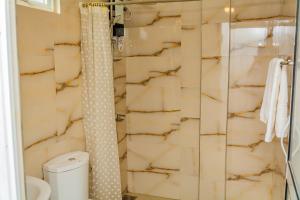 Koupelna v ubytování ShiCo Transit Hotel + 20 fotografií