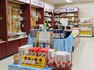 a store with boxes on display in a store at Unohama Onsen Royal Hotel Kobayashi in Joetsu