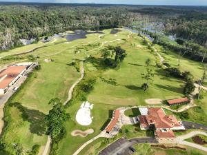 an overhead view of the golf course at a resort at Grand Hotel Djibloho in Djibloho
