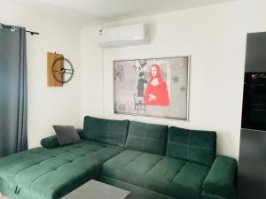 A seating area at Apartman Olive