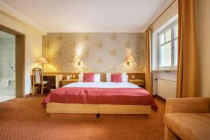 Una cama o camas en una habitación de Landschloss Ernestgrün App 412
