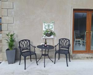 Patio nebo venkovní prostory v ubytování SANDYS SHORE APARTMENT