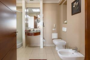 Koupelna v ubytování Regardal Hotel