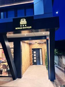 una señal para un restaurante marroquí en un edificio en MONARC Boutique ApartHotel - SELF CHECK-IN en Iaşi