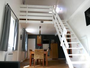 Телевизор и/или развлекательный центр в Appartement hypercentre 6 pers