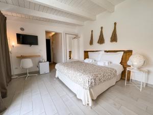 Posteľ alebo postele v izbe v ubytovaní San Michele Luxury Rooms